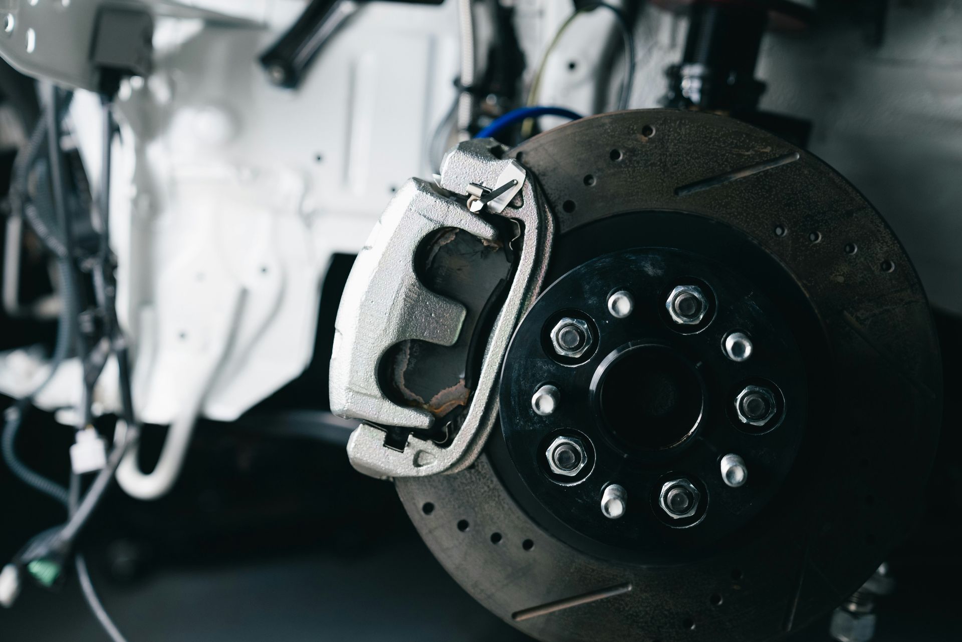 Close-up of a car's brake rotor and caliper